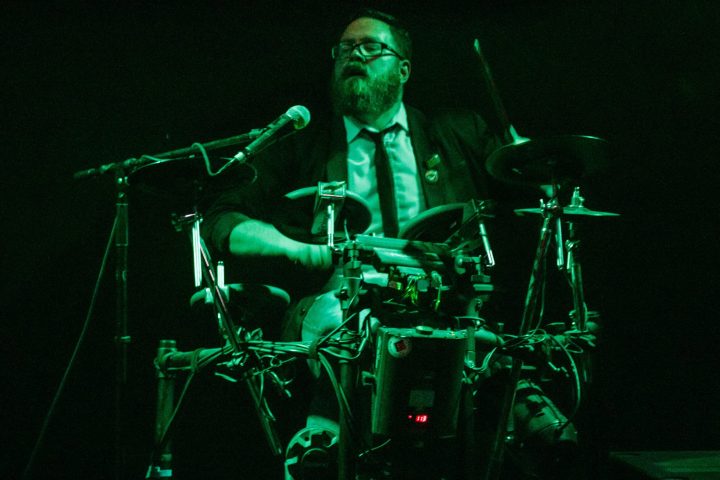 a person sitting on a stage