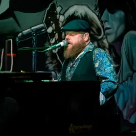 a person sitting on a stage